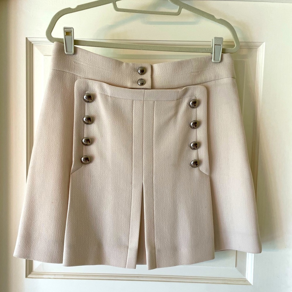 Chloé ivory wool double-breasted mini skirt w/ front pleat and engraved buttons